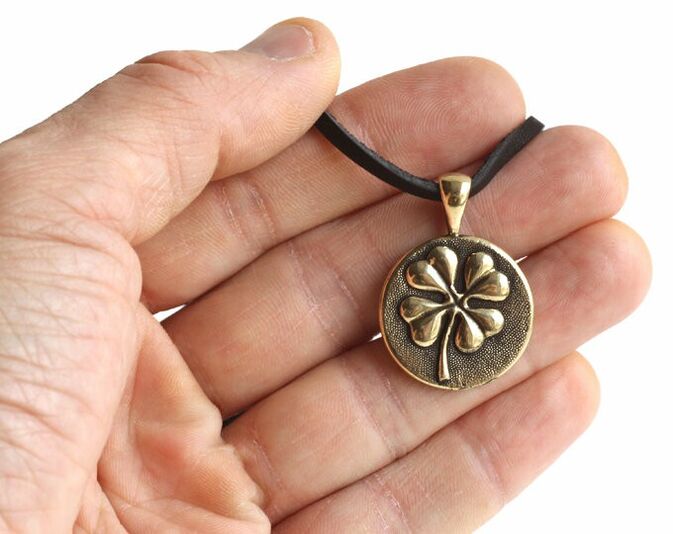four-leaf clover amulet — brings good luck and love
