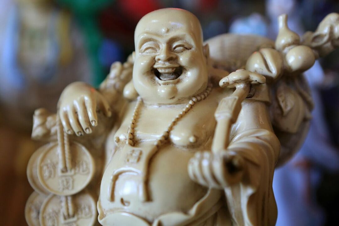 the amulet of health and family well-being - Buddha laughs