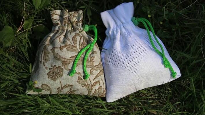 Household bags with herbs and stones, attracting success in business